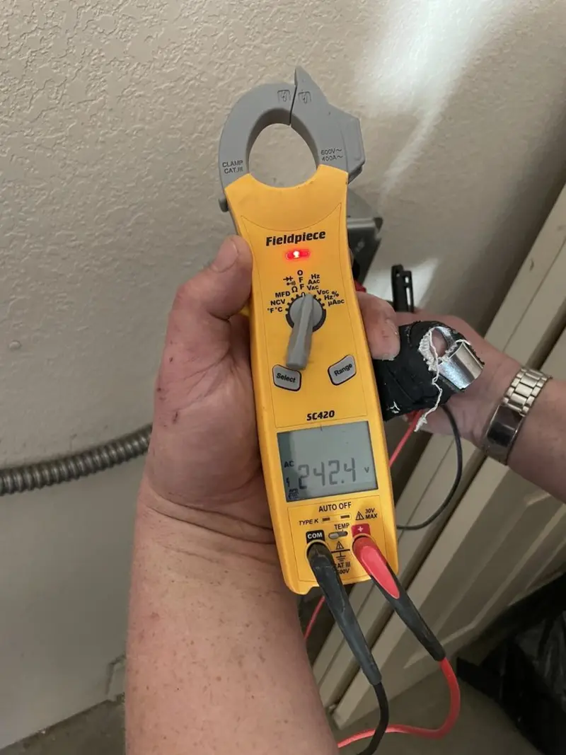 Voltage testing with clamp meter during Electrical Installation Services in Zephyrhills North